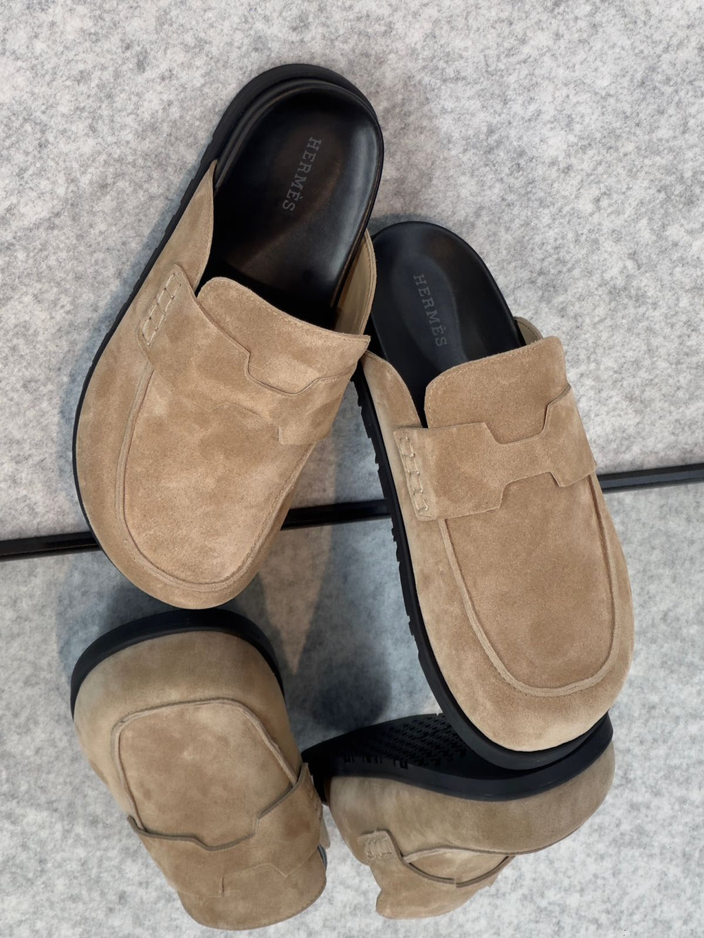 Hermès Go Mule, a suede calfskin mule lightweight rubber sole. back view and heel tab